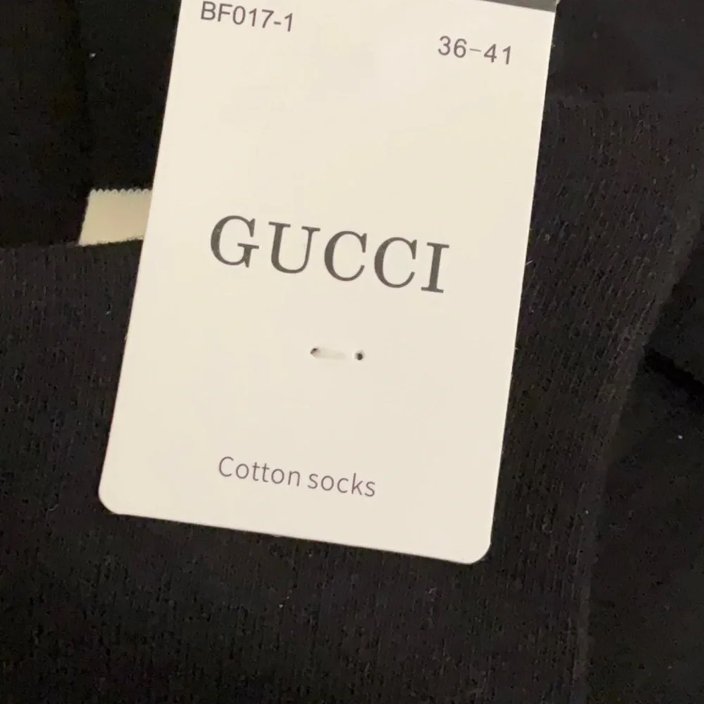 Gucci Men's Black and White Striped Socks Collection